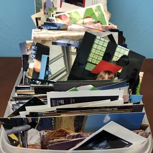photo prints in a scanning box